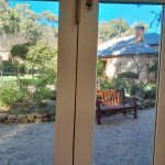 View of House and Garden through Coach House Doors